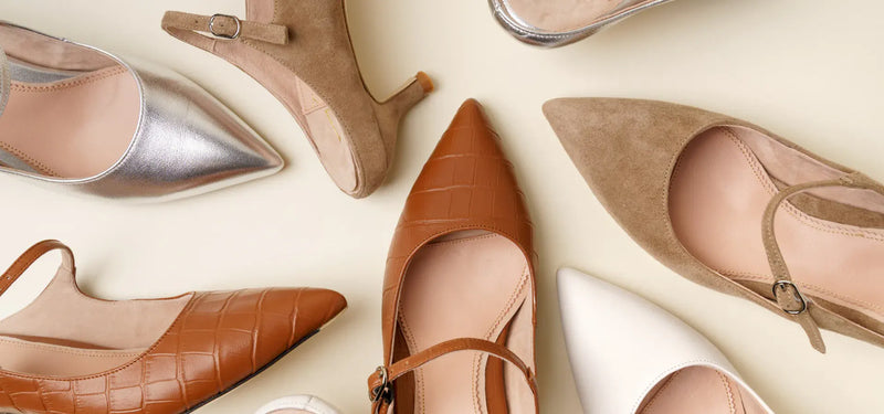 Assorted women’s pointed-toe shoes in brown, beige, silver, and white, featuring slingback and Mary Jane styles.