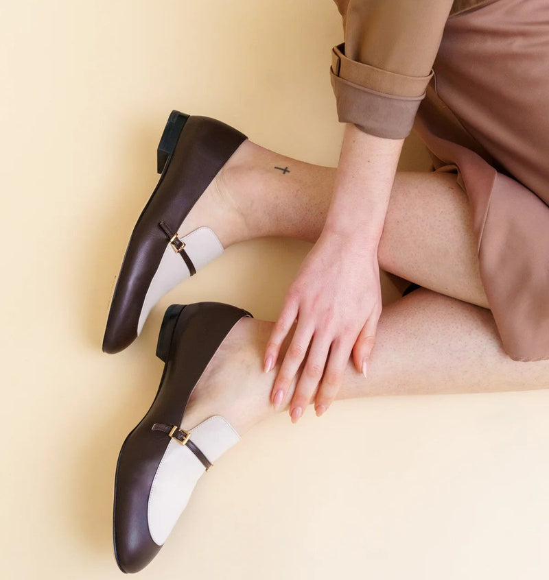 A lady wearing the Chocolate & Ecru Mix Calf Leather Loafer from ALLY Shoes.