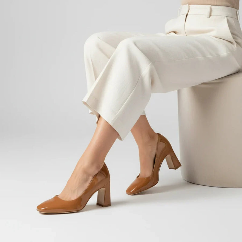 ALLY Shoes Bronze Bliss patent leather square toe block heels styled with cream tailored trousers